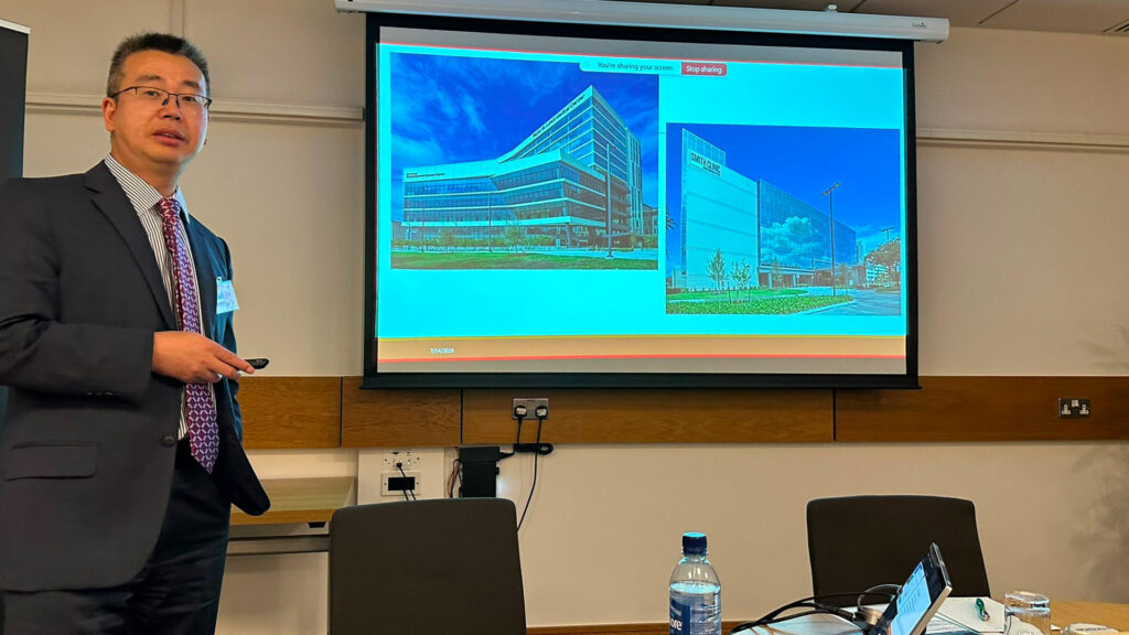 Dr. Sun delivering a presentation